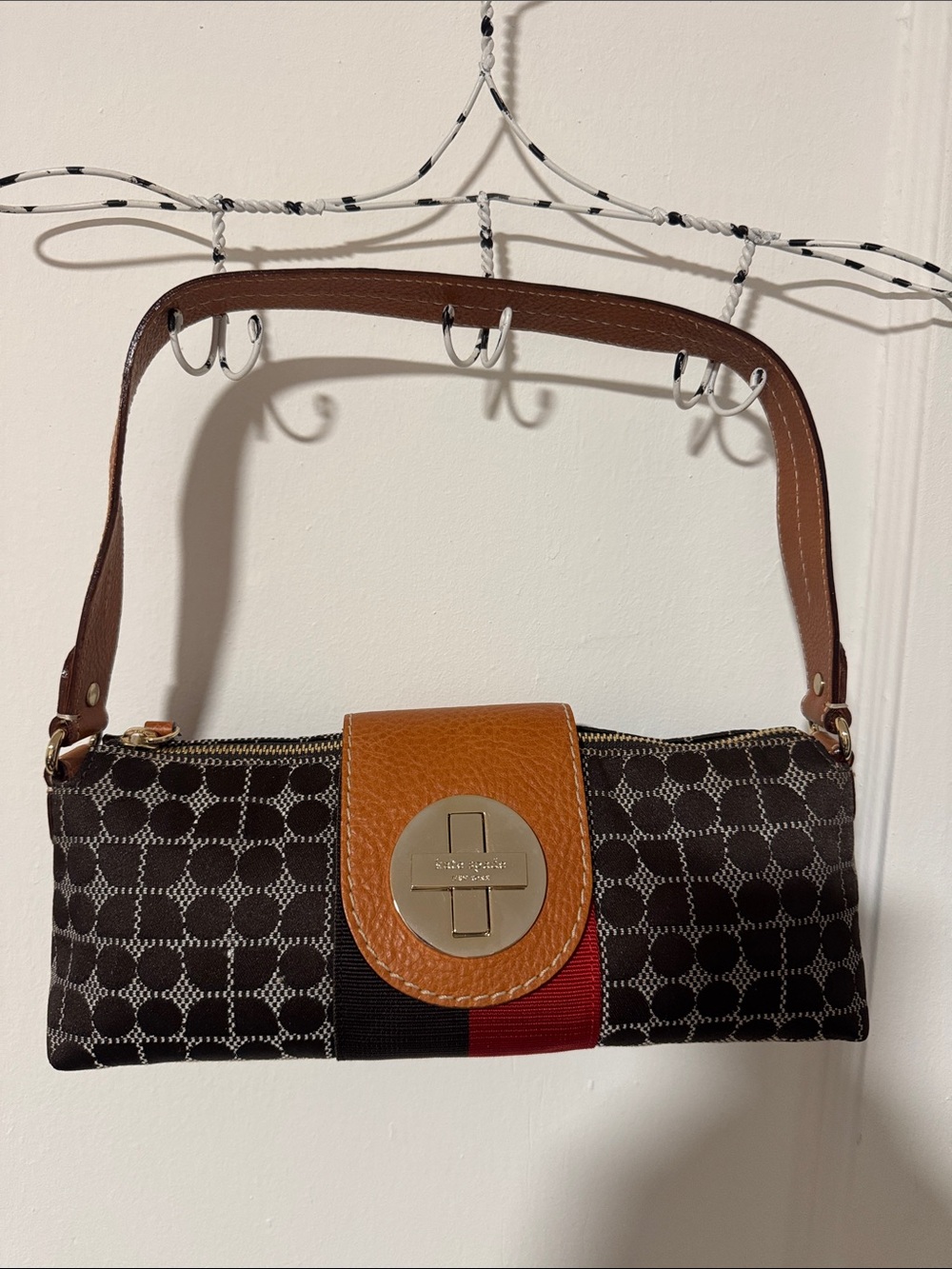 Kate Spade purse with metal fastener